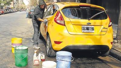 Trapitos quieren que les abran un lavadero de autos en Río Cuarto