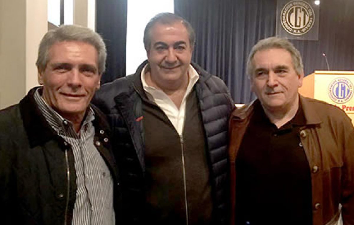Un triunvirato para unificar a la CGT