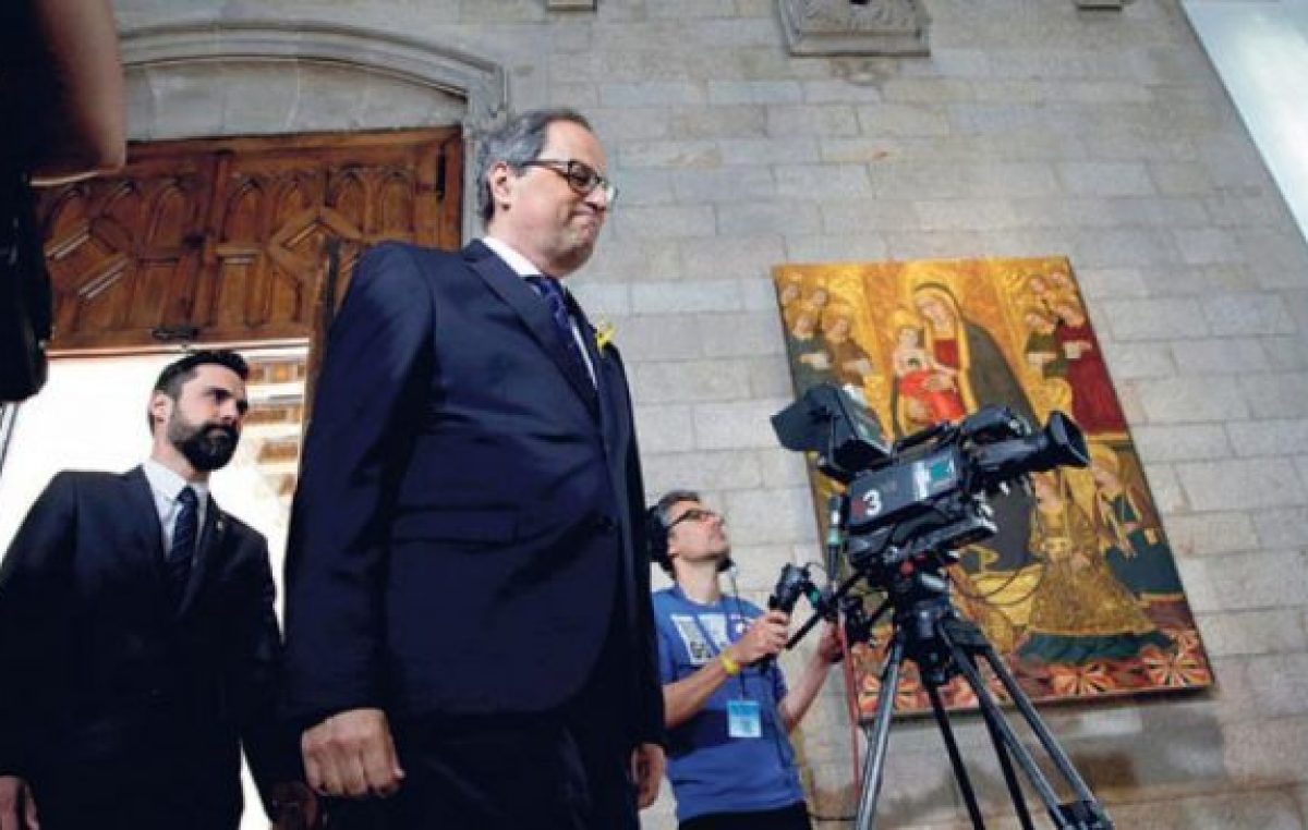Quim asumió en Cataluña sin símbolos de España